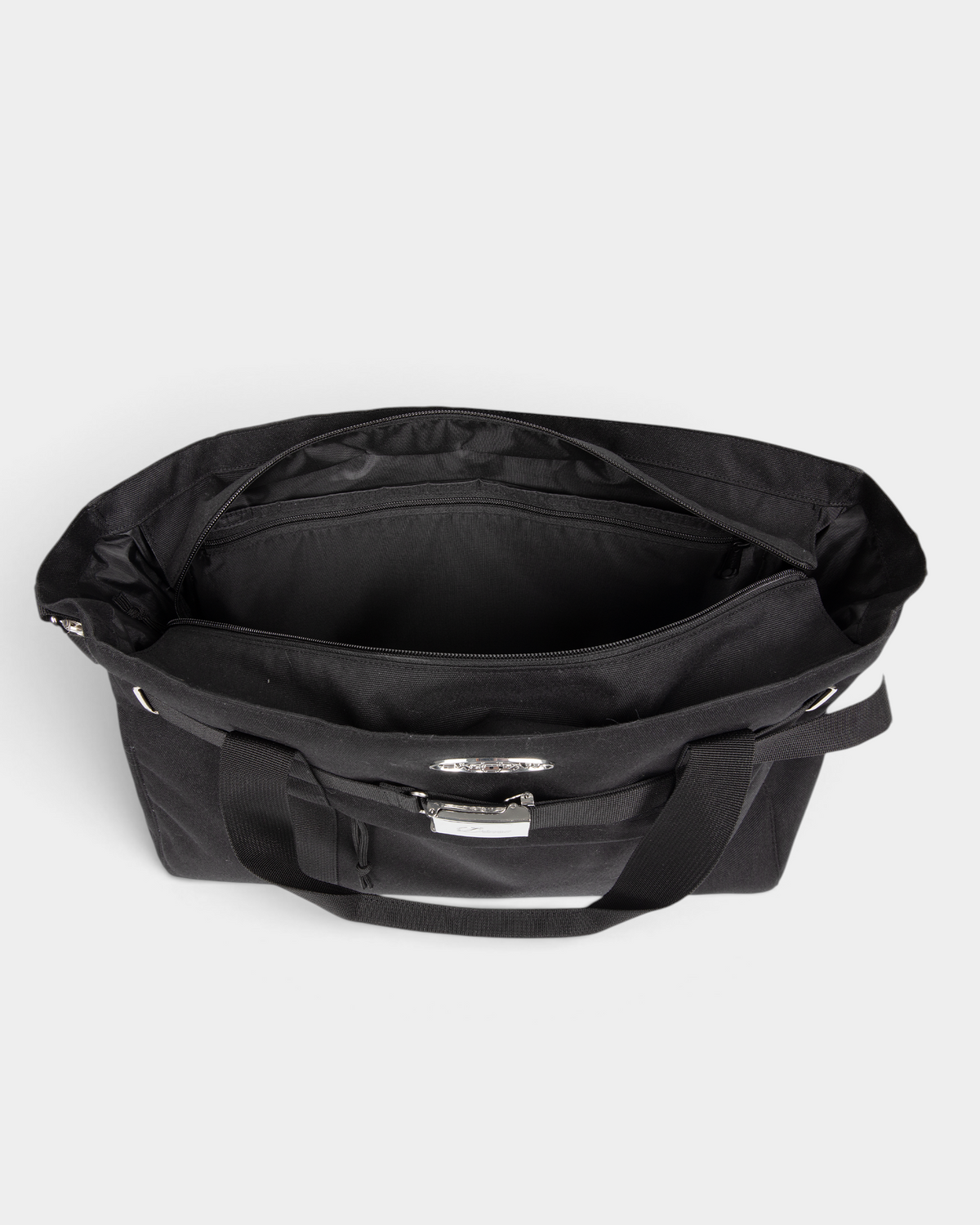 Eastpak x Dime Skate Tote in Dime Black seen from above with the top zip open, showing the lined interior and the zipped inner pocket