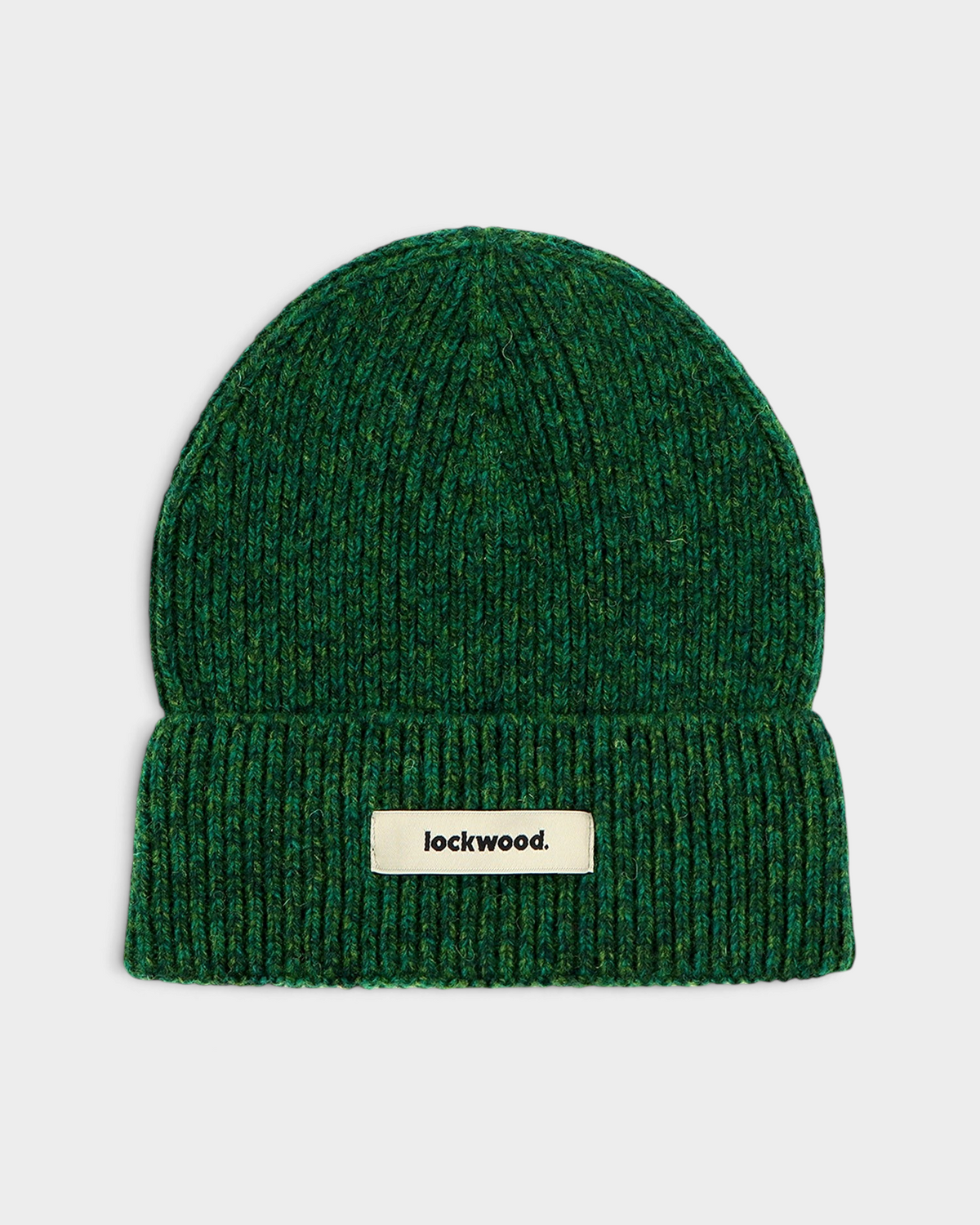 Lockwood Beanie in Green: a deep green marl rib knit with a folded cuff and a woven lockwood label