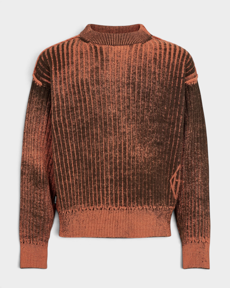 Lockwood Avenue Han Kjøbenhavn Printed Knit Sweater in Rusty Orange, front view of the wide-ribbed crewneck with a dark brown spray-dyed finish over the orange knit and a diamond logo near the right hem