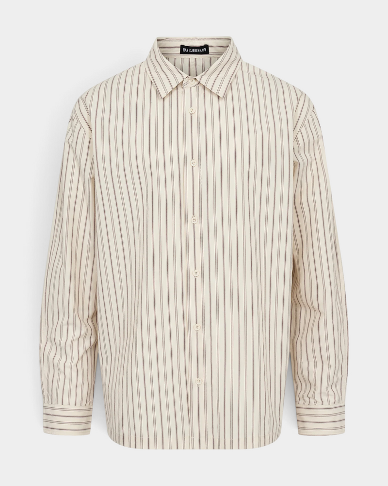 Han Kjøbenhavn Striped Casual Shirt in Off White laid flat from the front, showing the fine brown stripe, the button-down collar and the centre-front placket