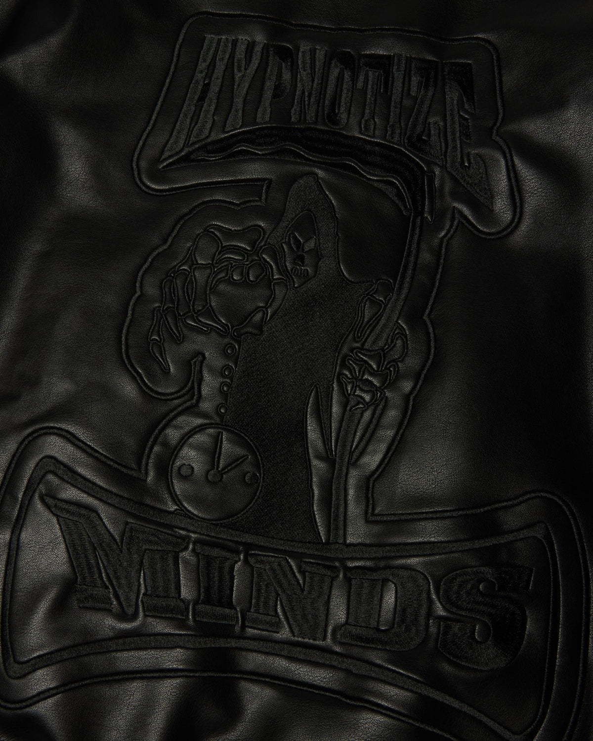 HUF x Three 6 Mafia Jacket - Black, close-up of the embossed Hypnotize Minds graphic on the back