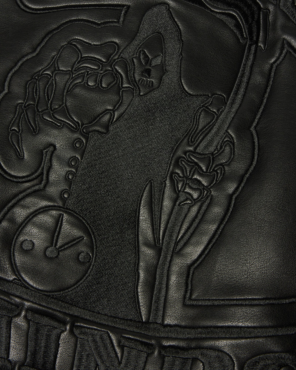 HUF x Three 6 Mafia Jacket - Black, closer detail of the embossed reaper graphic