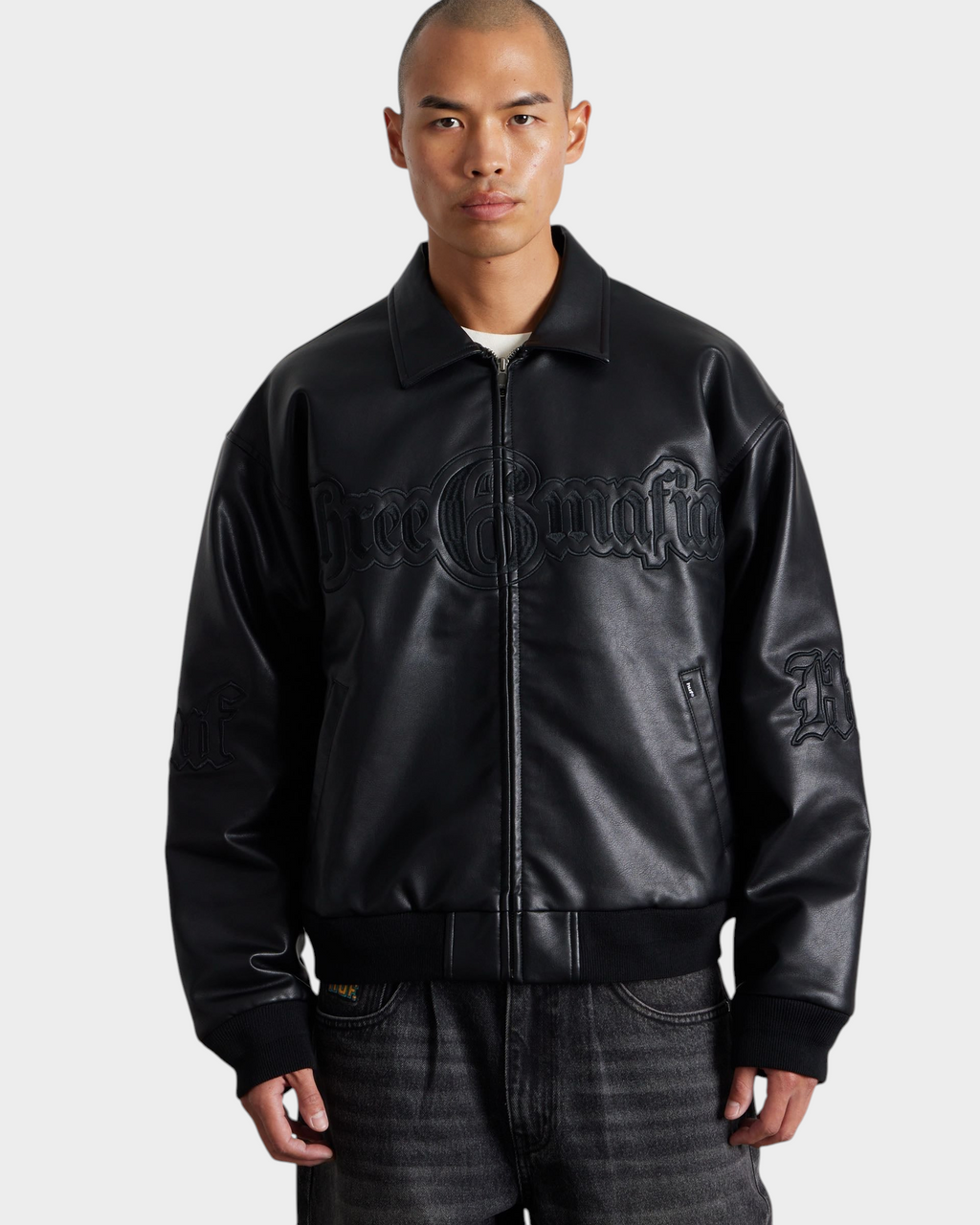 HUF x Three 6 Mafia Jacket - Black, worn by a model, front