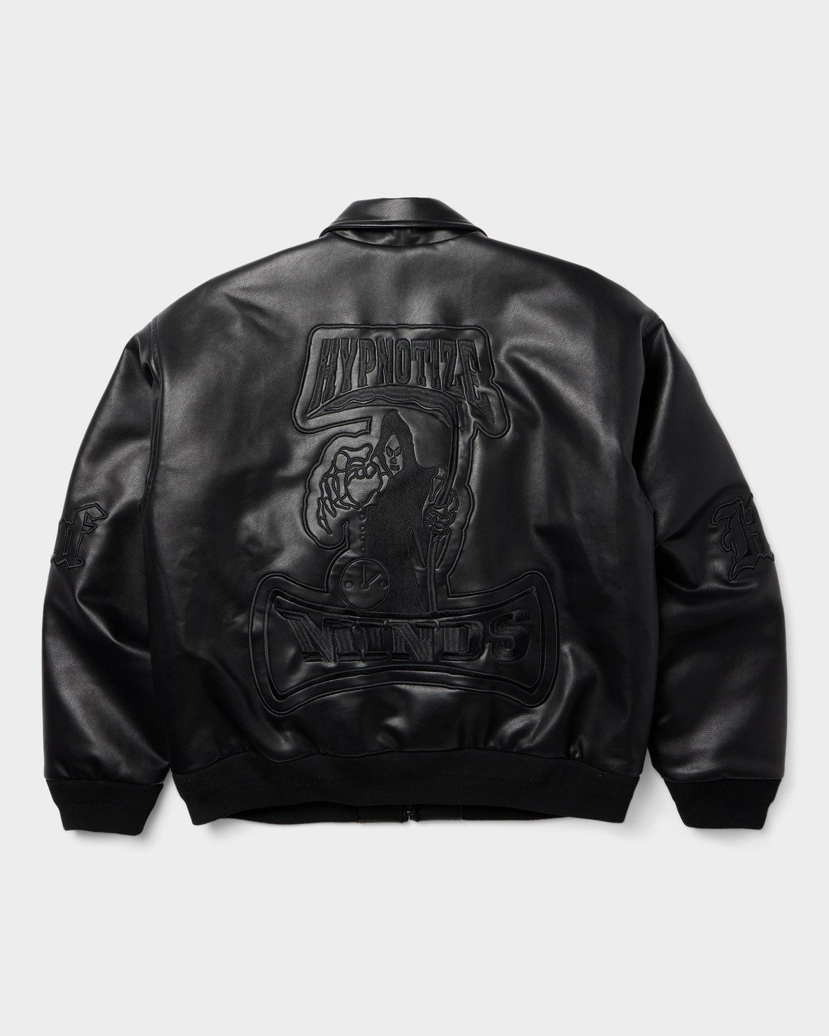 HUF x Three 6 Mafia Jacket - Black, back flat-lay with the embossed Hypnotize Minds reaper graphic