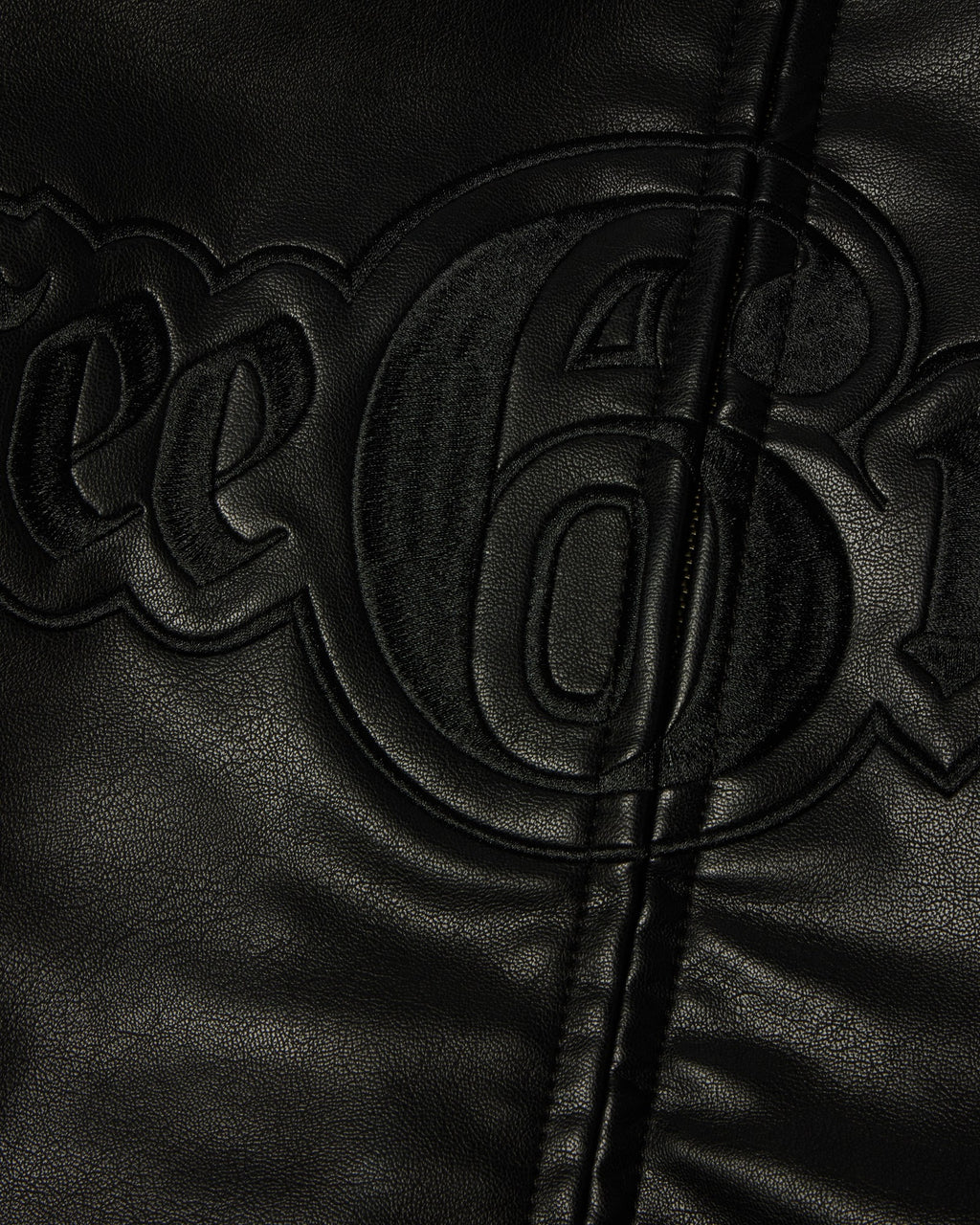 HUF x Three 6 Mafia Jacket - Black, close-up of the lettering running across the zip