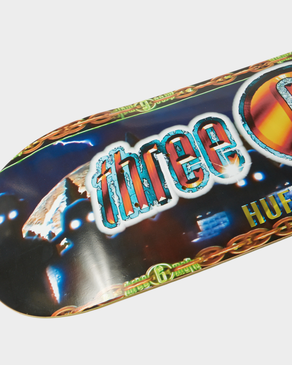 HUF x Three 6 Mafia Skate Deck 8.25" - Multi, close-up of the three 6 lettering at one end of the top graphic