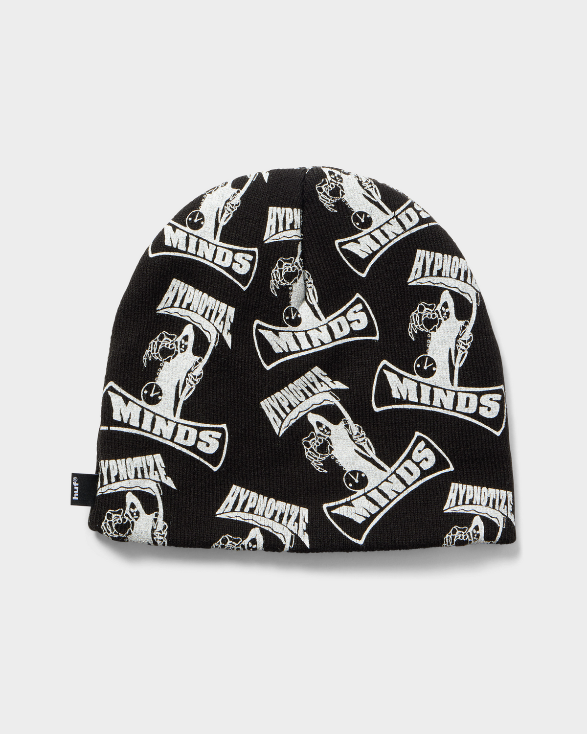 HUF x Three 6 Mafia Skull Beanie - Black, front, all-over Hypnotize Minds print and the woven label on the side