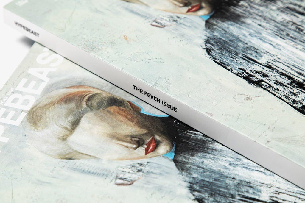 Hypebeast Magazine Issue 32 close up on the spine reading THE FEVER ISSUE, with the Jun Takahashi cover painting and its pencil sketch detail either side