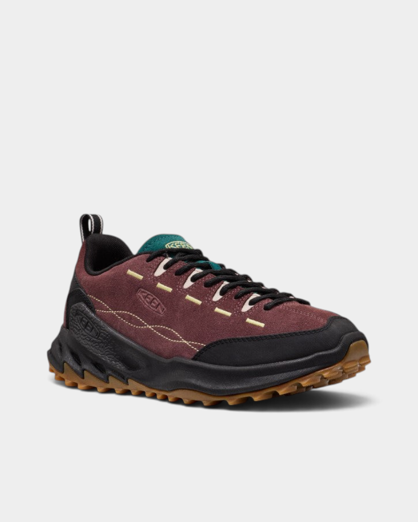 Keen Jasper Zionic Shoes in Huckleberry/Lemongrass, close-up on the upper and the lacing, deep wine suede with a black toe bumper, gum lugged outsole and pale yellow stitching