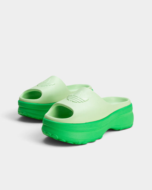 Lockwood Avenue adidas Adifom Stan Slide women's energy green molded EVA foam platform slides with perforated details.