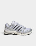 Lockwood Avenue adidas Adistar Control 5 sneakers in silver metallic, gray, and black with an open mesh upper.