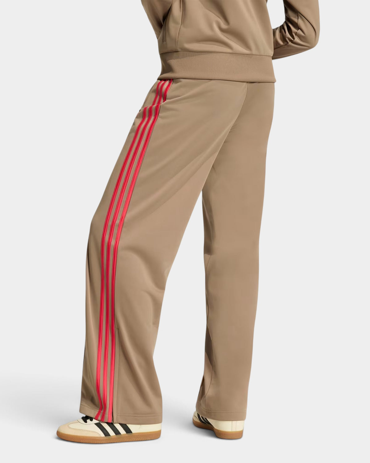 Lockwood Avenue adidas Firebird loose fit tricot track pants in beige with red 3-Stripes side detail