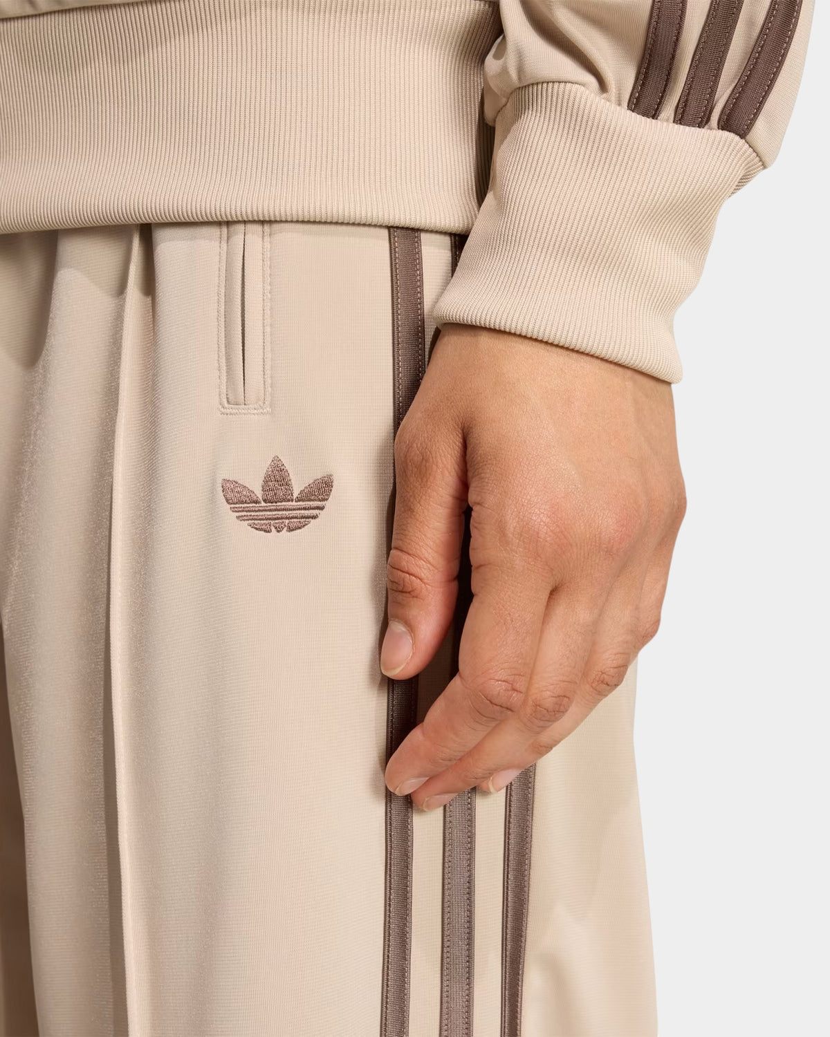 Lockwood Avenue adidas Firebird loose track pants in beige tricot with brown 3-Stripes and embroidered Trefoil logo
