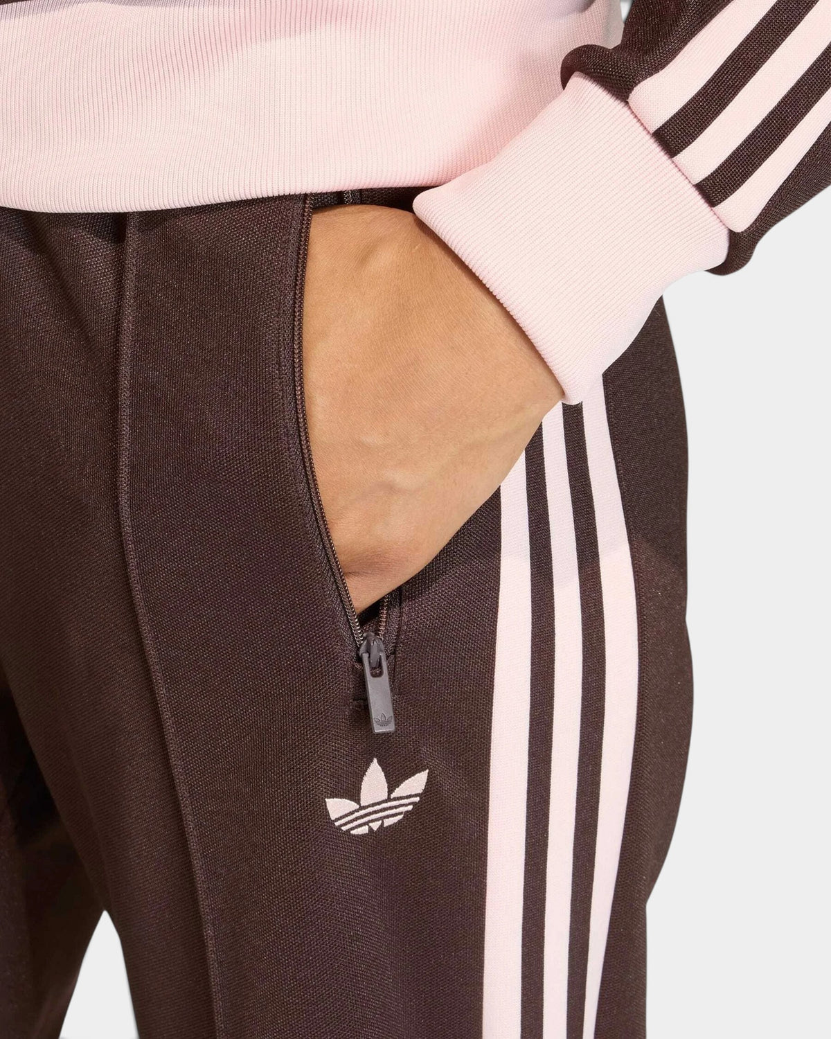 Lockwood Avenue adidas Firebird loose track pants in brown tricot with pink 3-Stripes and zippered pocket detail