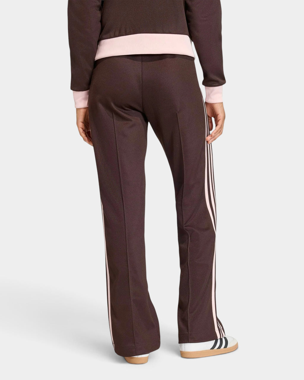 Lockwood Avenue adidas Firebird loose track pants in dark brown with light pink 3-Stripes, back view