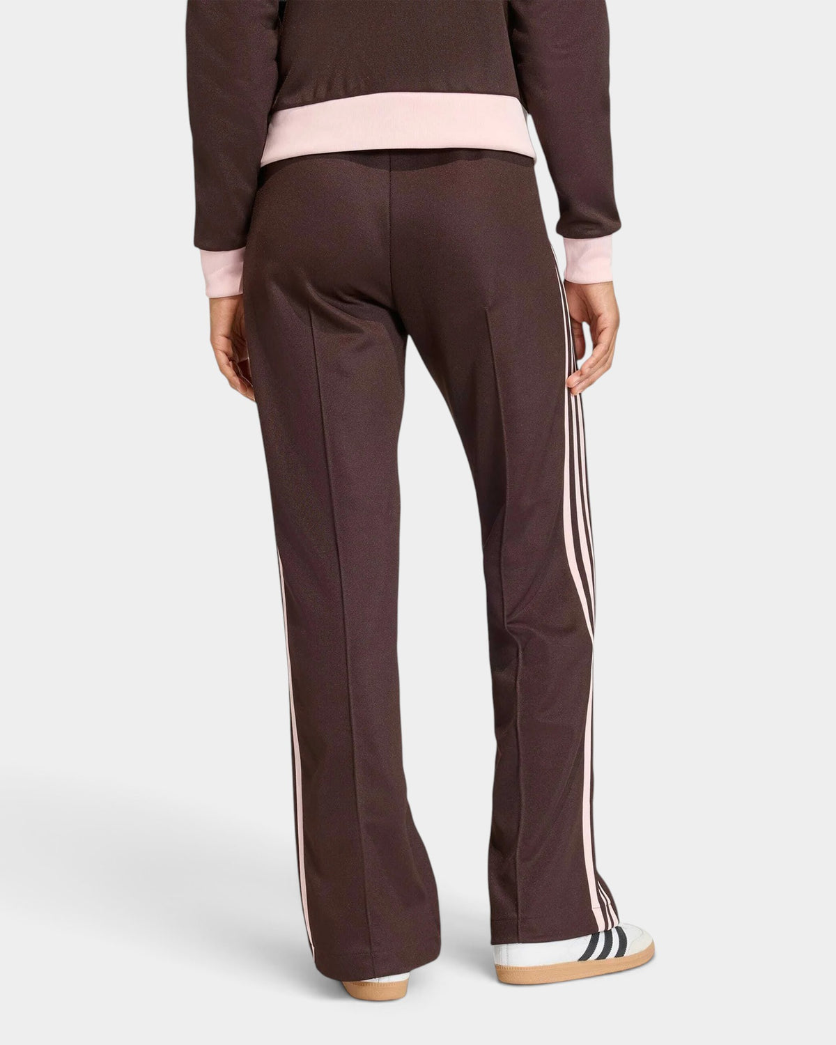 Lockwood Avenue adidas Firebird loose track pants in dark brown with light pink 3-Stripes, back view