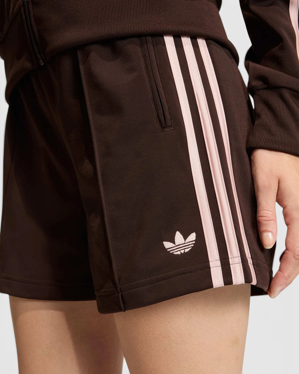 Lockwood Avenue adidas Firebird classic shorts in dark brown tricot fabric with light pink 3-Stripes and logo