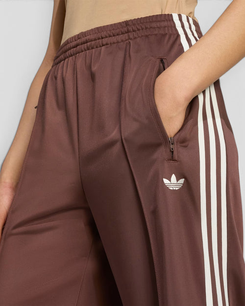 Lockwood Avenue adidas Adicolor chestnut auburn loose track pants with cream white side stripes and zip pockets