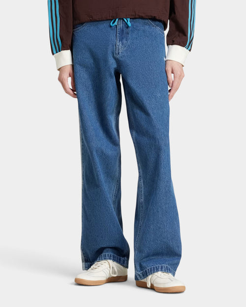 Lockwood Avenue adidas Adicolor denim Firebird pants in blue with side 3-Stripes and a relaxed fit