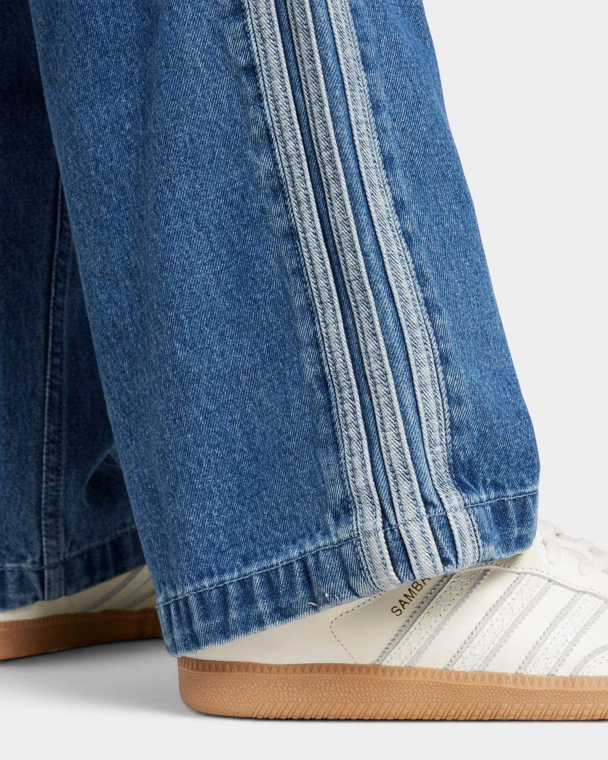 Lockwood Avenue adidas Adicolor denim Firebird pants featuring iconic 3-Stripes detail on the side leg