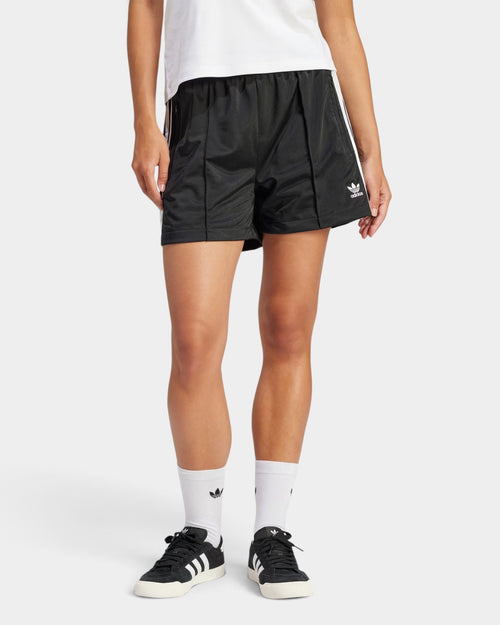 Lockwood Avenue adidas Firebird black tricot shorts with white side stripes, elastic waist, and zip pockets