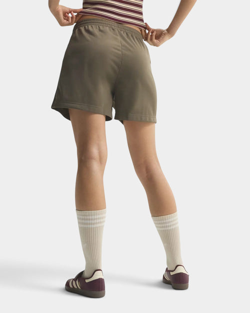 Lockwood Avenue adidas Firebird Classic olive green tricot shorts with a loose fit and mid-rise waist, back view.