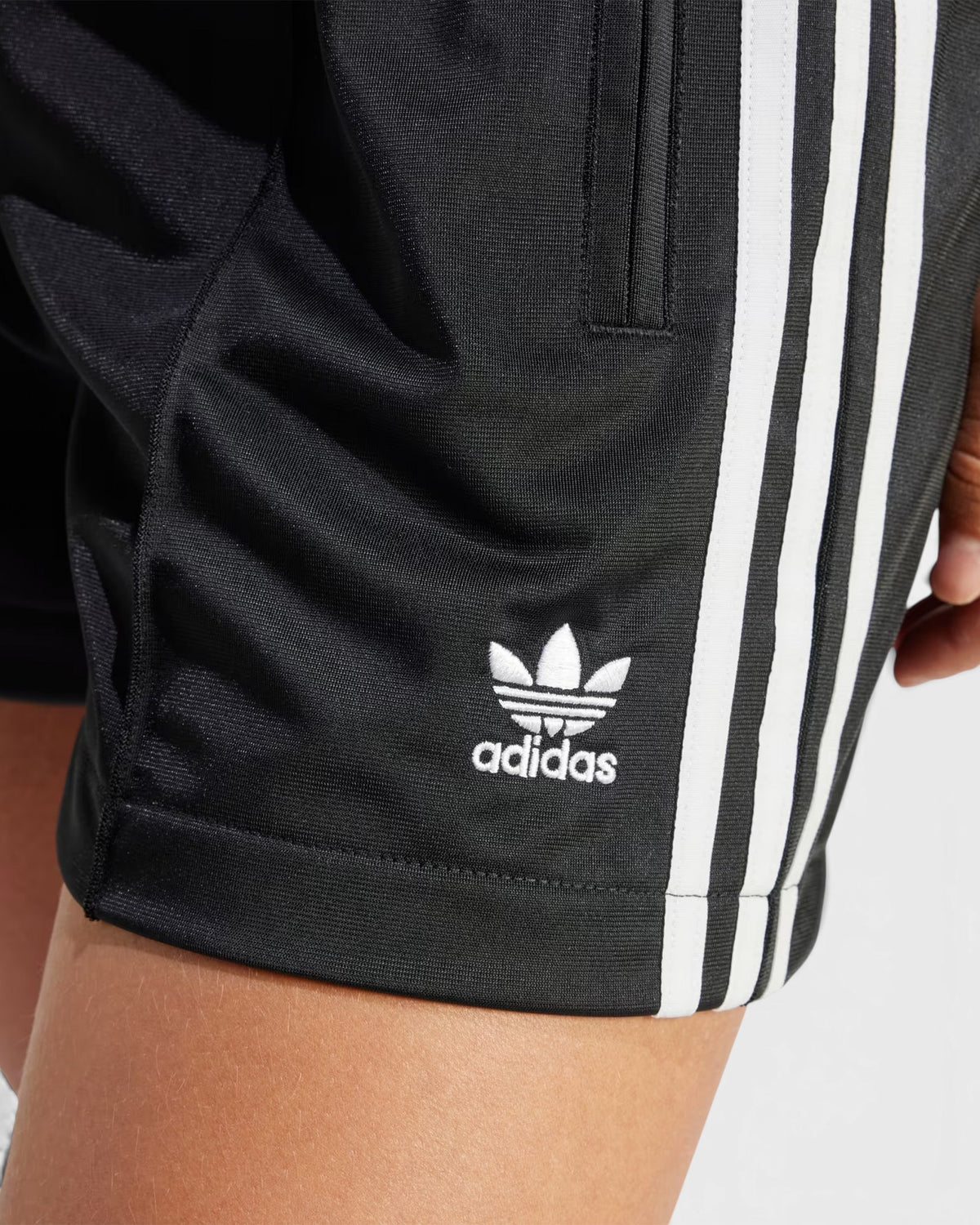 Lockwood Avenue adidas Firebird black tricot shorts with white three-stripe detailing and embroidered logo
