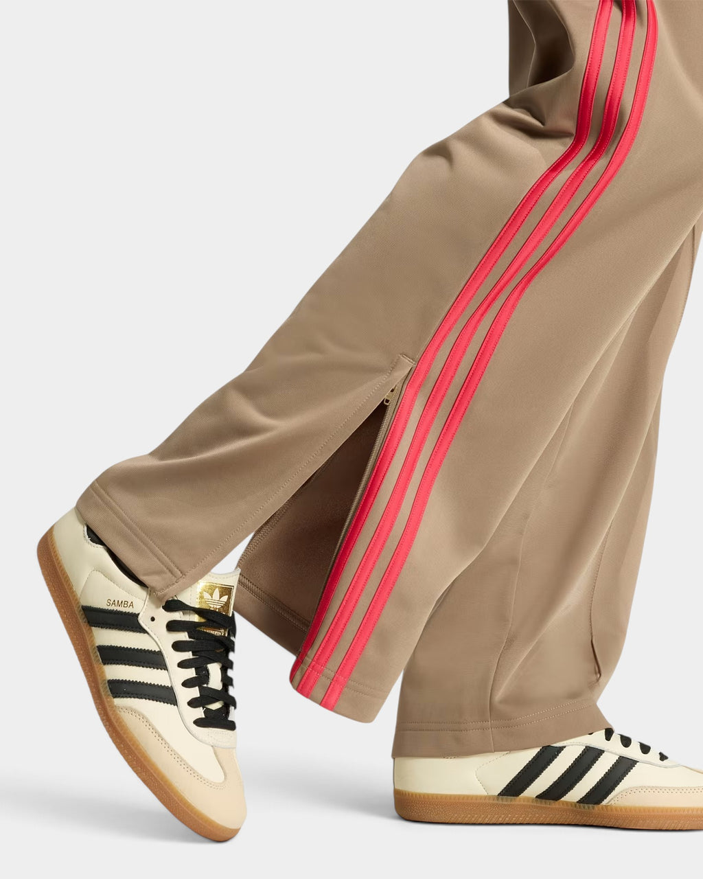 Lockwood Avenue adidas Firebird loose track pants in beige with bright pink 3-Stripes and side zip hem detail