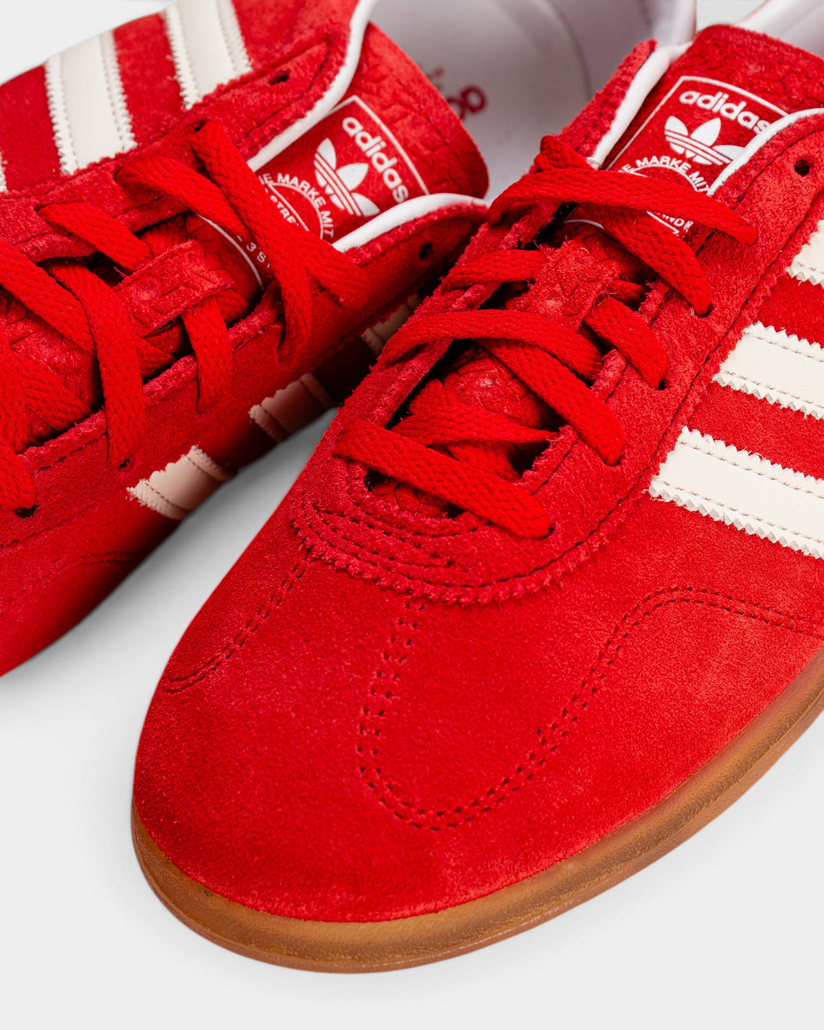 Lockwood Avenue adidas Gazelle Lo Pro women's sneakers in scarlet red suede with white 3-Stripes and slim gum sole.