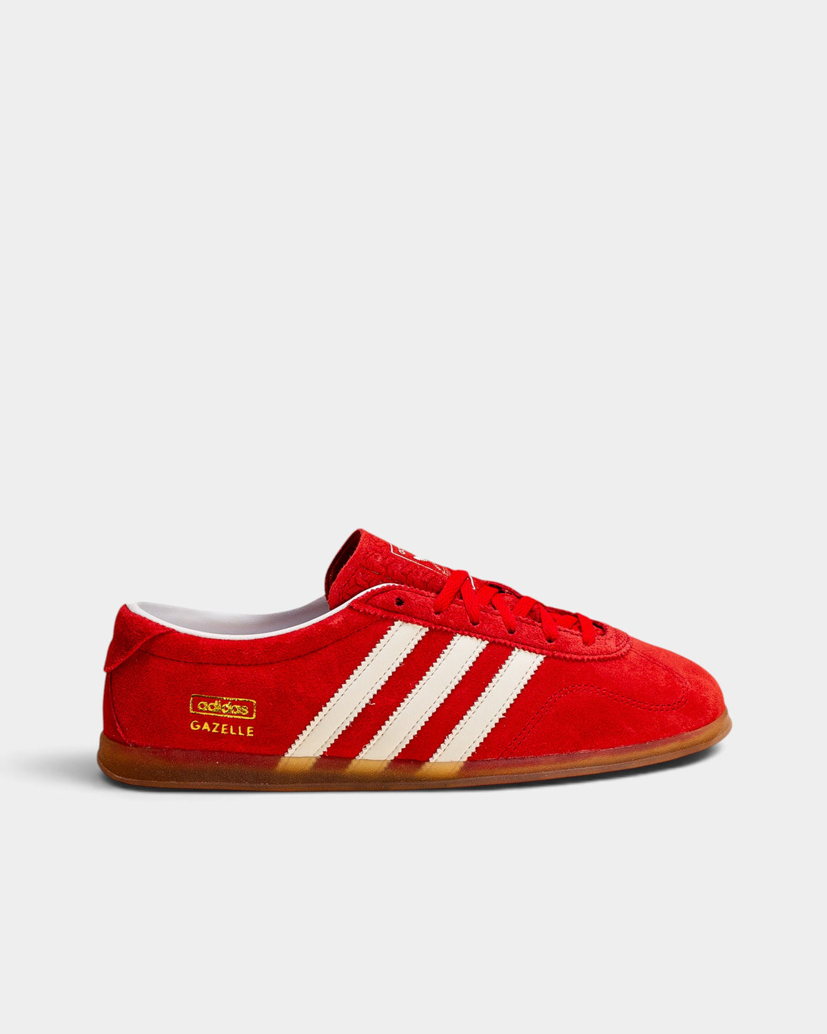 Lockwood Avenue adidas Gazelle Lo Pro women's scarlet suede sneakers with white 3-Stripes and a slim gum sole.