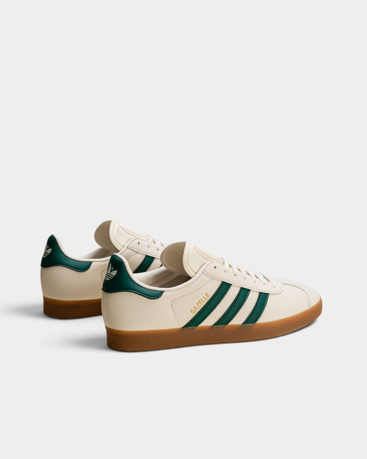 Lockwood Avenue adidas Gazelle sneakers in cloud white suede with core green stripes and a gum rubber outsole.
