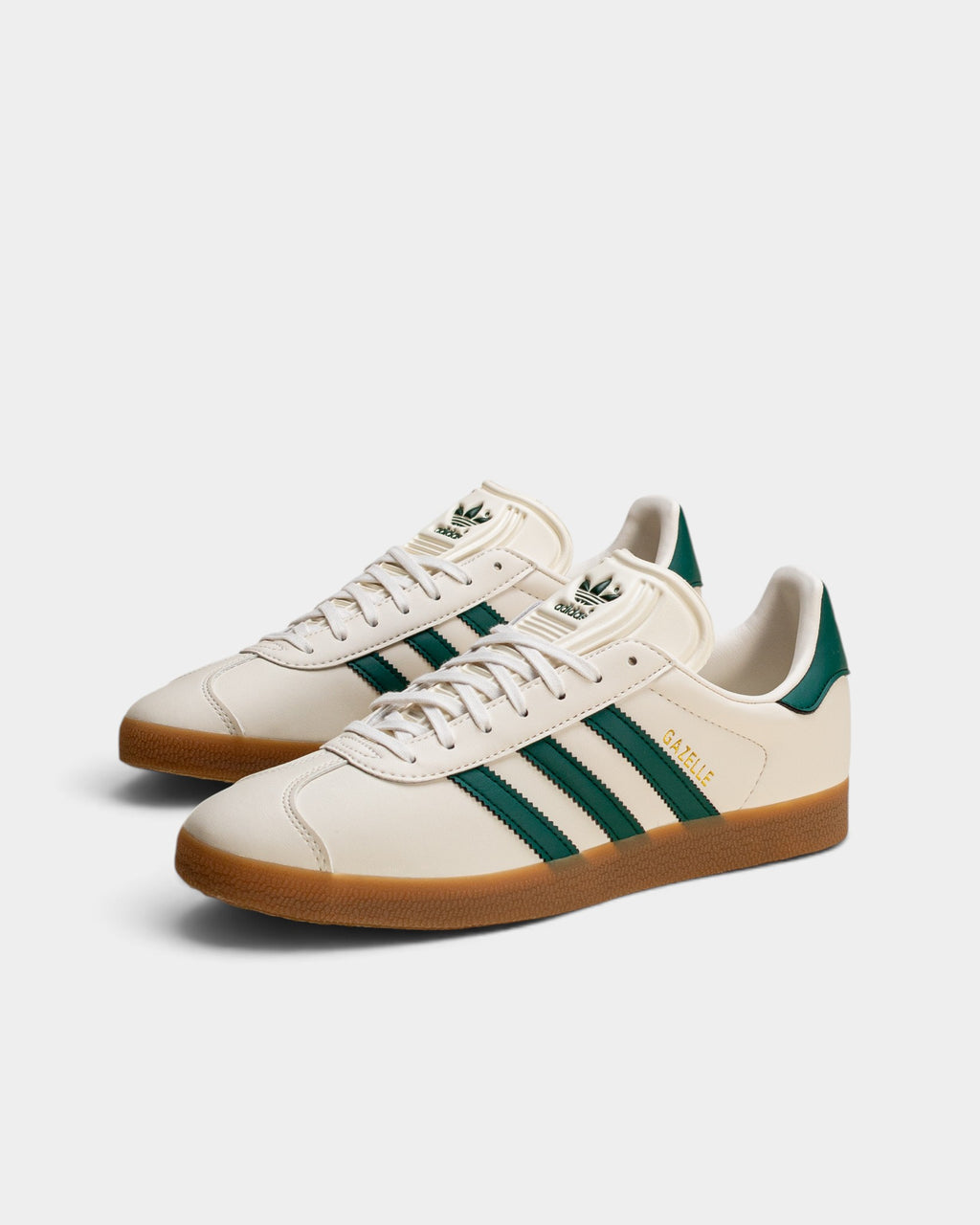 Lockwood Avenue adidas Gazelle sneakers in cloud white suede with core green stripes and a gum rubber outsole.