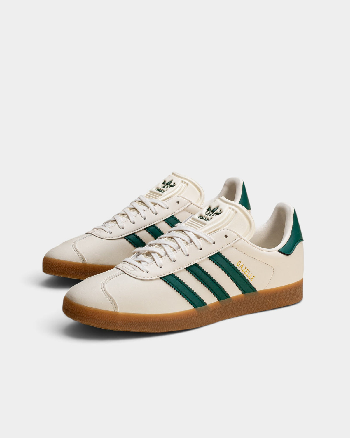 Lockwood Avenue adidas Gazelle sneakers in cloud white suede with core green stripes and a gum rubber outsole.