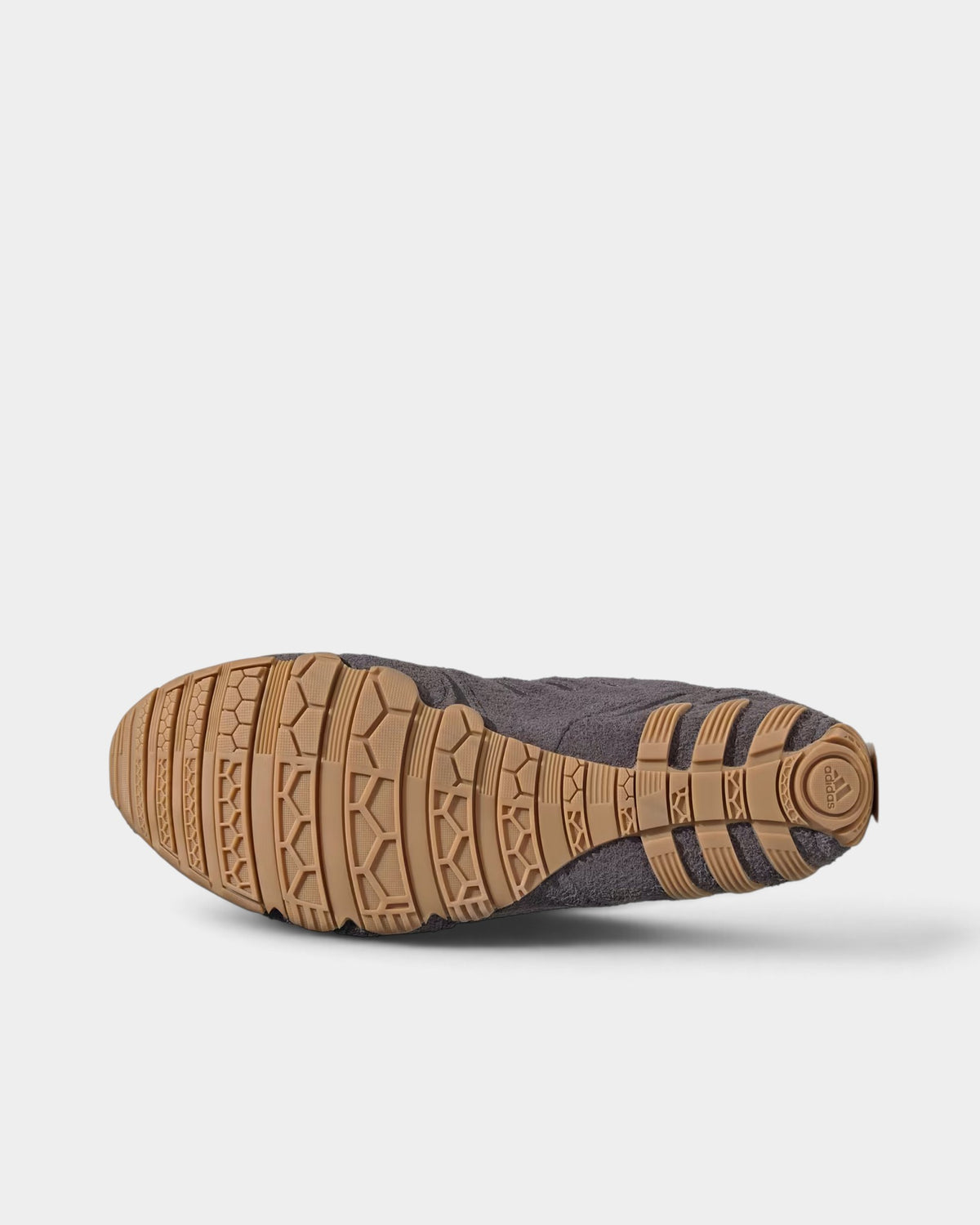 Lockwood Avenue adidas Ghost Sprint women's sneaker showing the low-profile gum rubber outsole and grey suede upper.