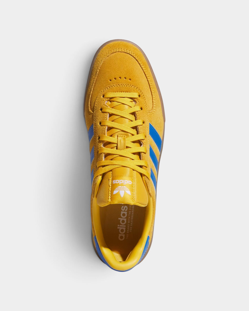Lockwood Avenue adidas Glenburn yellow suede skate shoes with blue stripes and a flexible gum rubber outsole