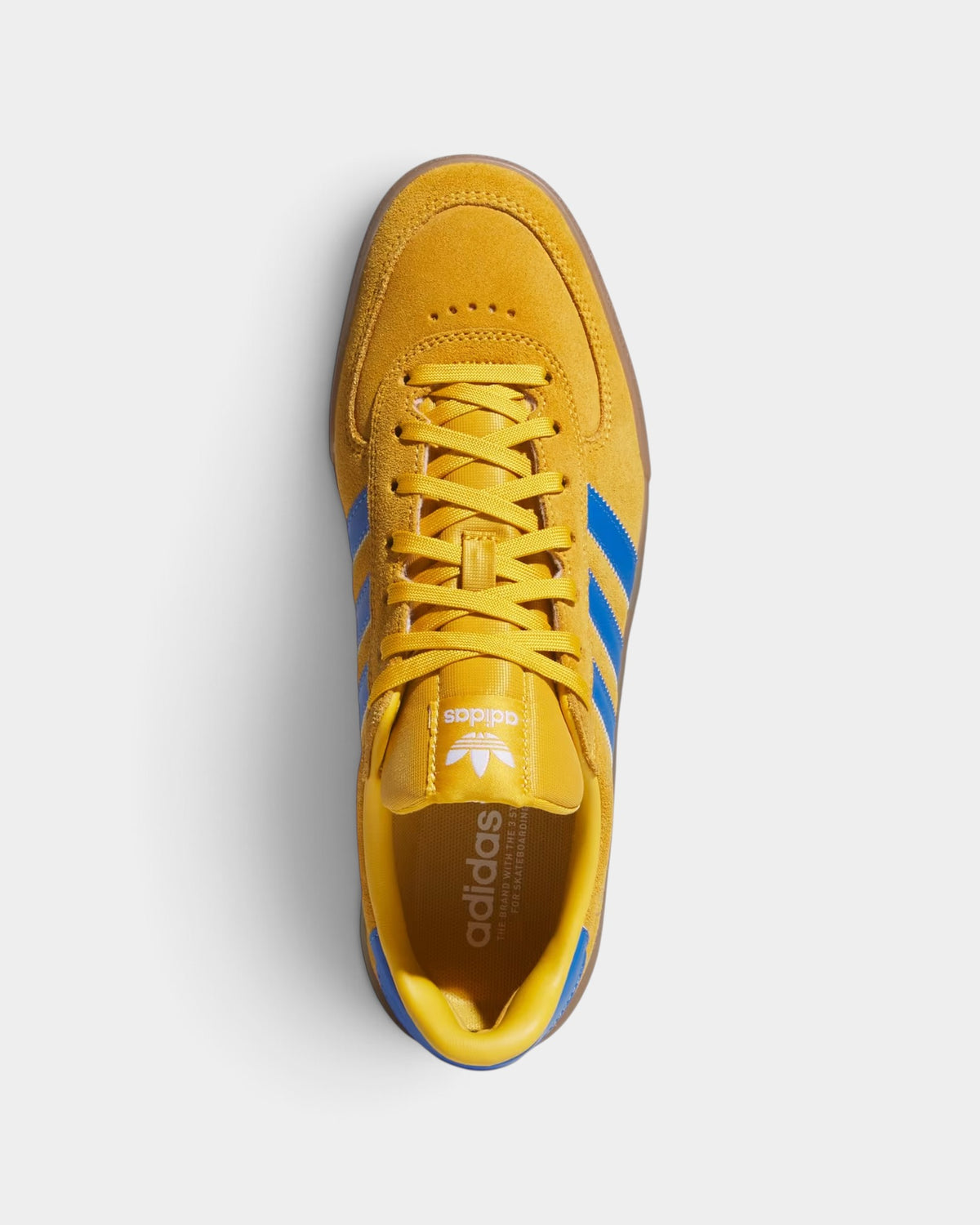 Lockwood Avenue adidas Glenburn yellow suede skate shoes with blue stripes and a flexible gum rubber outsole