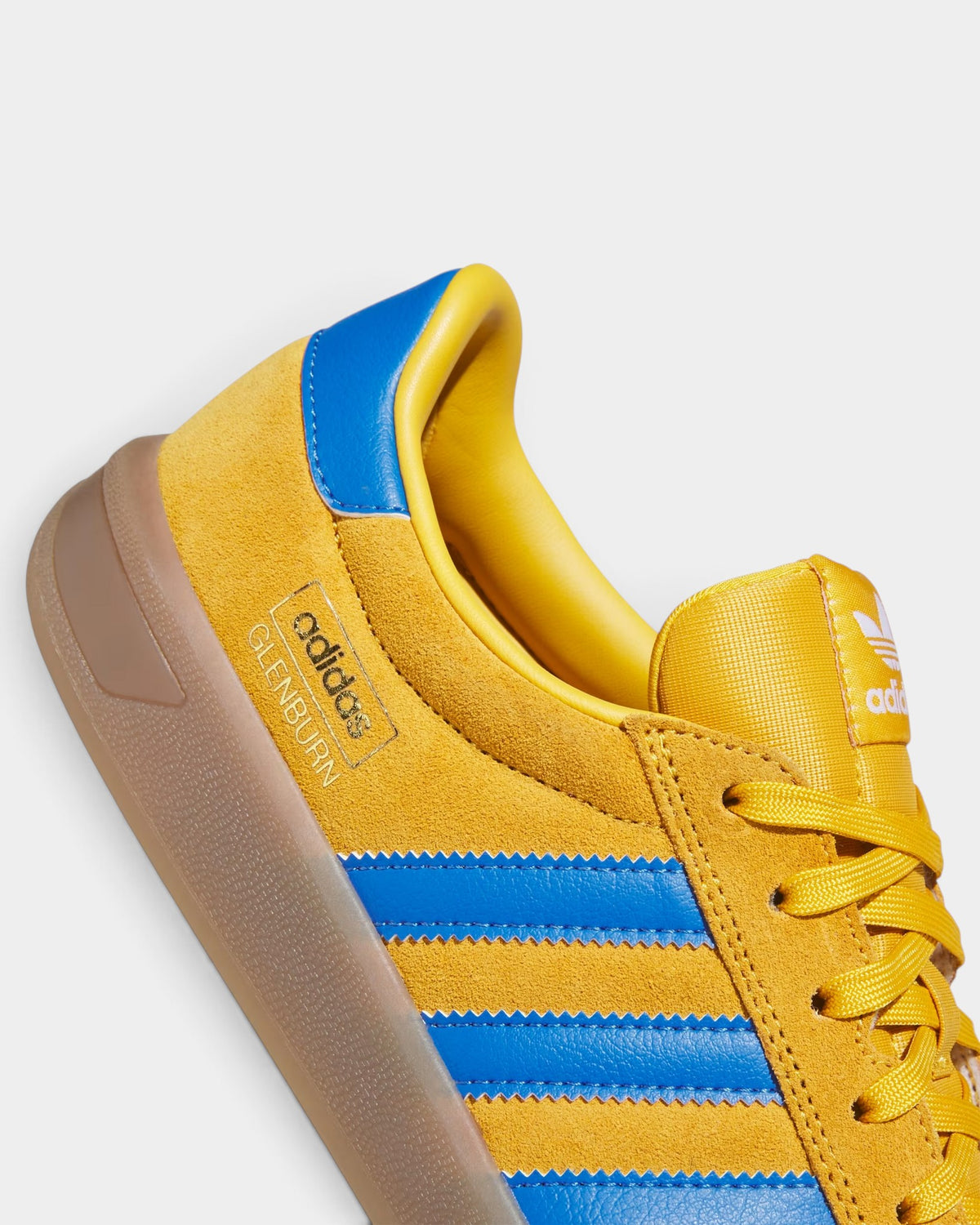Lockwood Avenue adidas Glenburn skate shoe in yellow suede with blue stripes and a durable gum rubber outsole