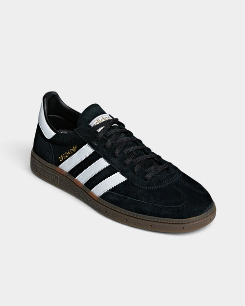 Lockwood Avenue adidas Handball Spezial black suede sneakers with white stripes, gold branding, and gum rubber sole.