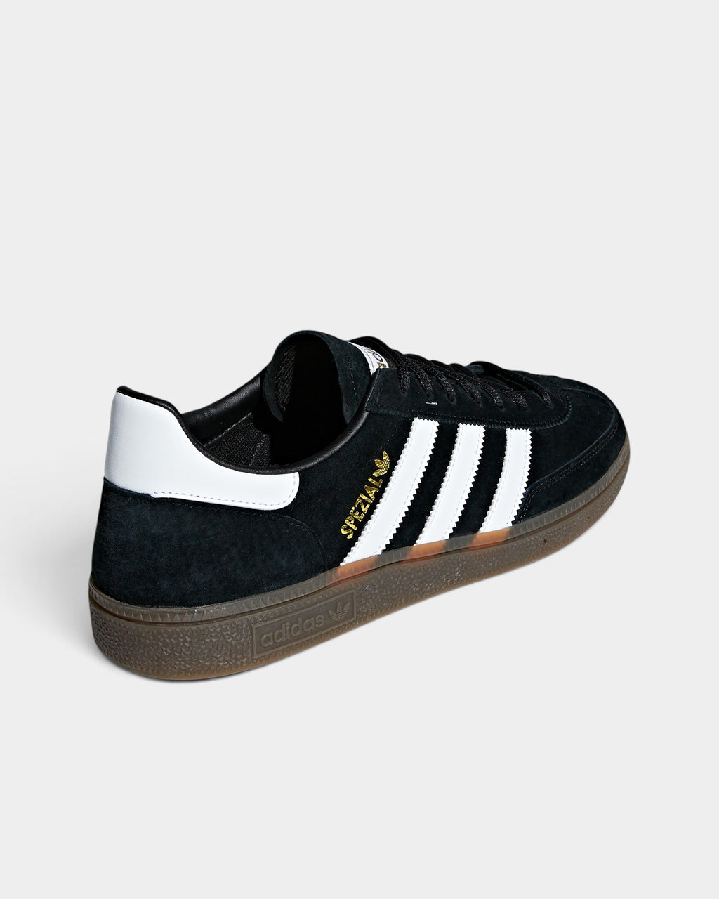 Lockwood Avenue adidas Handball Spezial black suede sneakers with white stripes, gold branding, and a gum rubber sole.