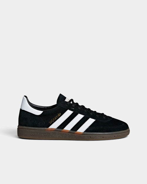 Lockwood Avenue adidas Handball Spezial black suede sneakers with white stripes, gold branding, and gum rubber sole.