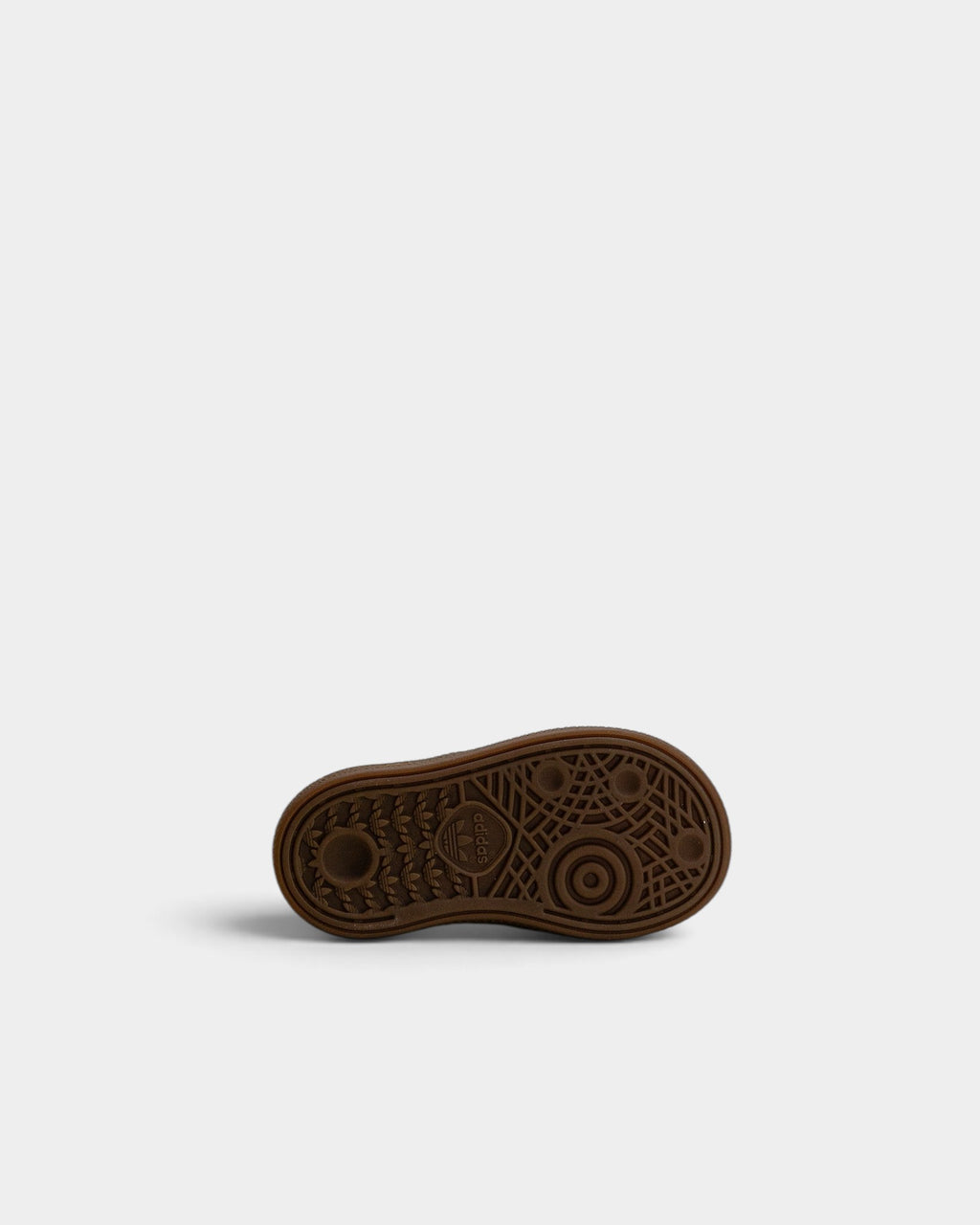 Lockwood Avenue adidas Handball Spezial kids shoes showing the brown gum rubber outsole with textured grip pattern