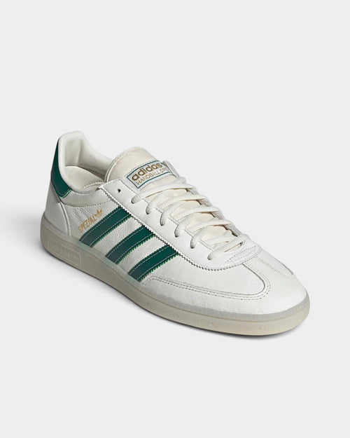 Lockwood Avenue adidas Handball Spezial sneakers in white leather with collegiate green stripes and gold branding.