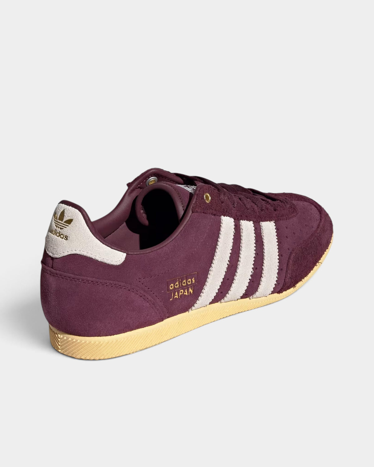 Lockwood Avenue adidas Japan maroon suede sneakers with cream white stripes and gold metallic branding details.