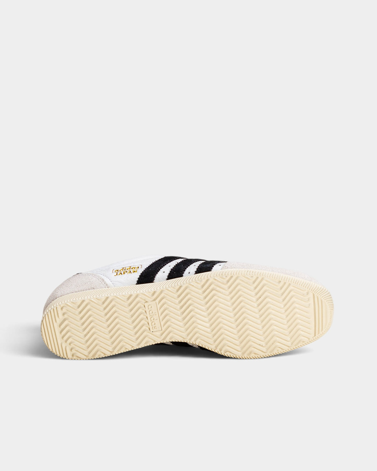 Lockwood Avenue adidas Japan women's trainer featuring a white perforated leather upper and rubber herringbone outsole