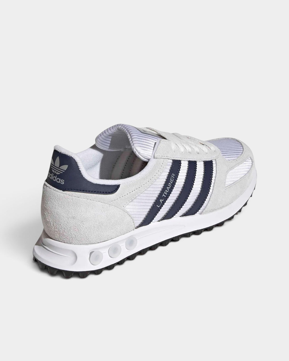 Lockwood Avenue adidas LA Trainer OG sneakers in white and night indigo with mesh, suede, and serrated 3-Stripes.
