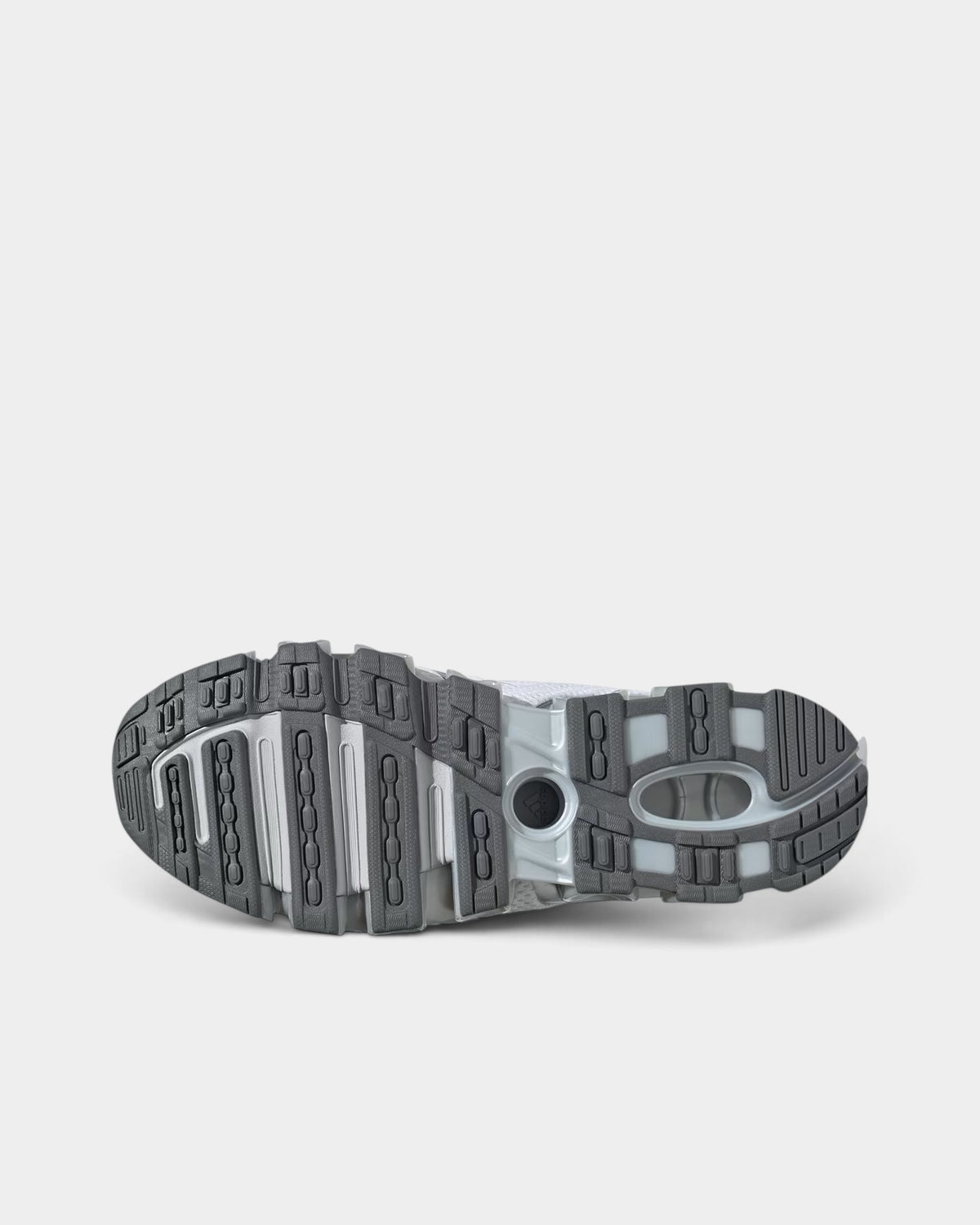 Lockwood Avenue adidas Mega Ghostride women's sneaker showing the grey and white Megaride rubber outsole tread