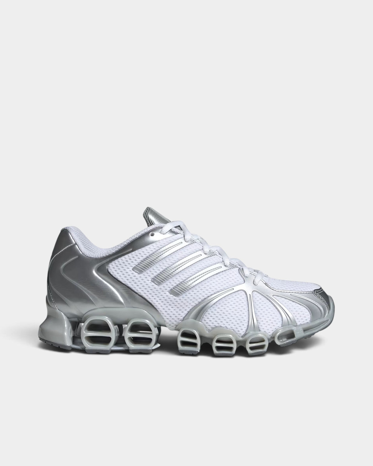 Lockwood Avenue adidas Mega Ghostride women's sneakers in white mesh with silver metallic 3-Stripes and cage detail.
