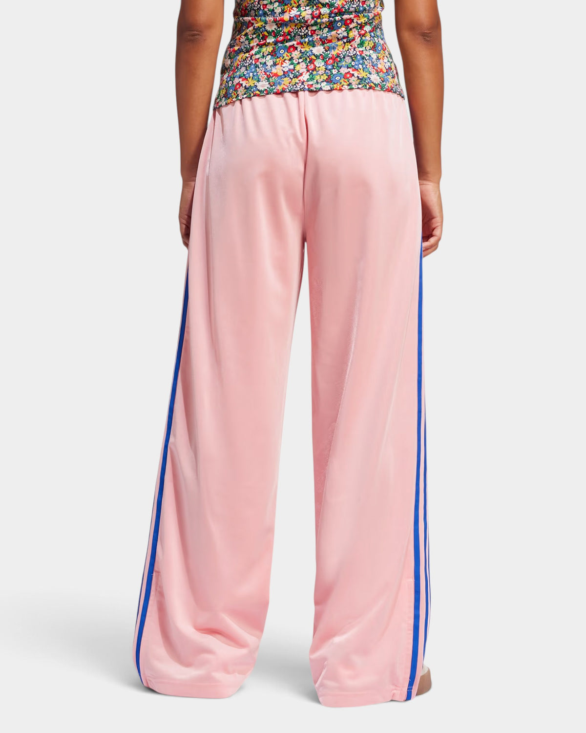 Lockwood Avenue adidas Adicolor Classic Firebird loose pink tricot track pants with blue side stripes, back view