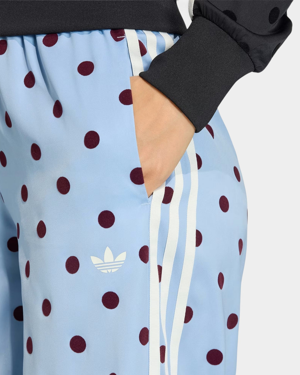 Lockwood Avenue adidas satin wide leg pants in light blue with dark red polka dots and signature white side stripes.