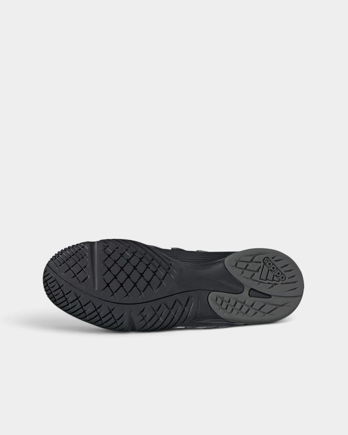 Lockwood Avenue adidas Predator Sala indoor futsal shoe showing the black non-marking rubber outsole tread pattern.